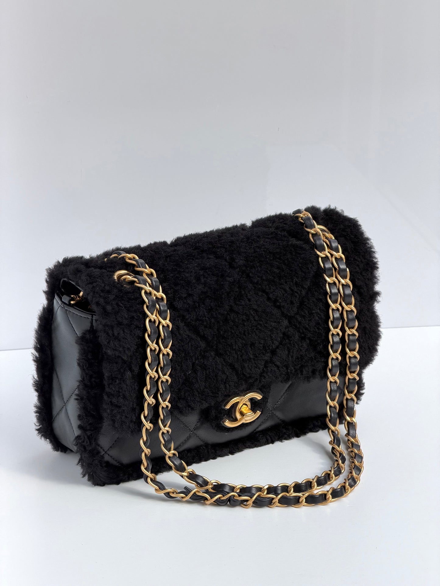 Chanel 24K Black Shearling Medium Flap Bag