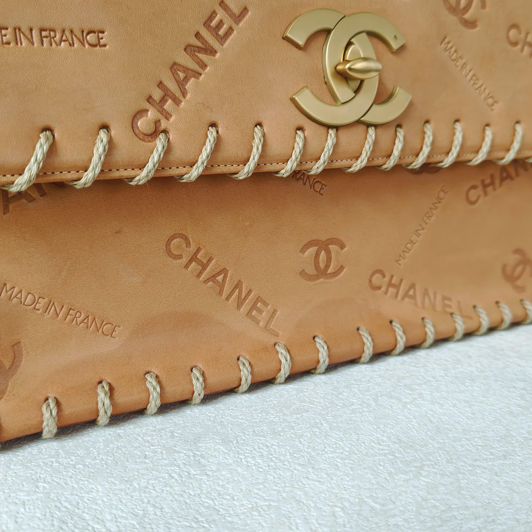 Chanel Maxi Classic Flap Bag Tan Debossed Logo Calfskin Whipstitched Gold Hardware 1994