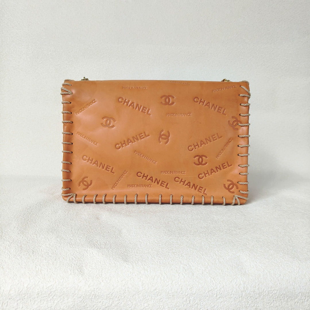 Chanel Maxi Classic Flap Bag Tan Debossed Logo Calfskin Whipstitched Gold Hardware 1994