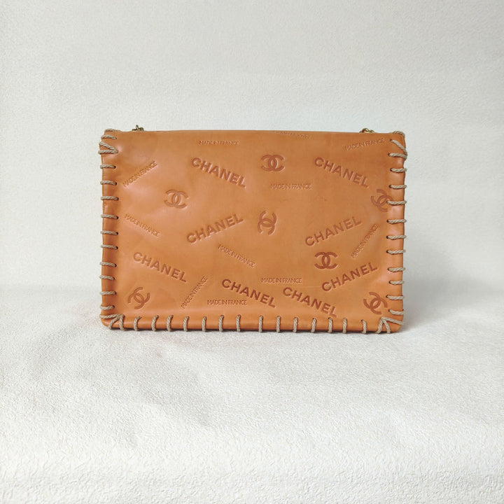 Chanel Maxi Classic Flap Bag Tan Debossed Logo Calfskin Whipstitched Gold Hardware 1994