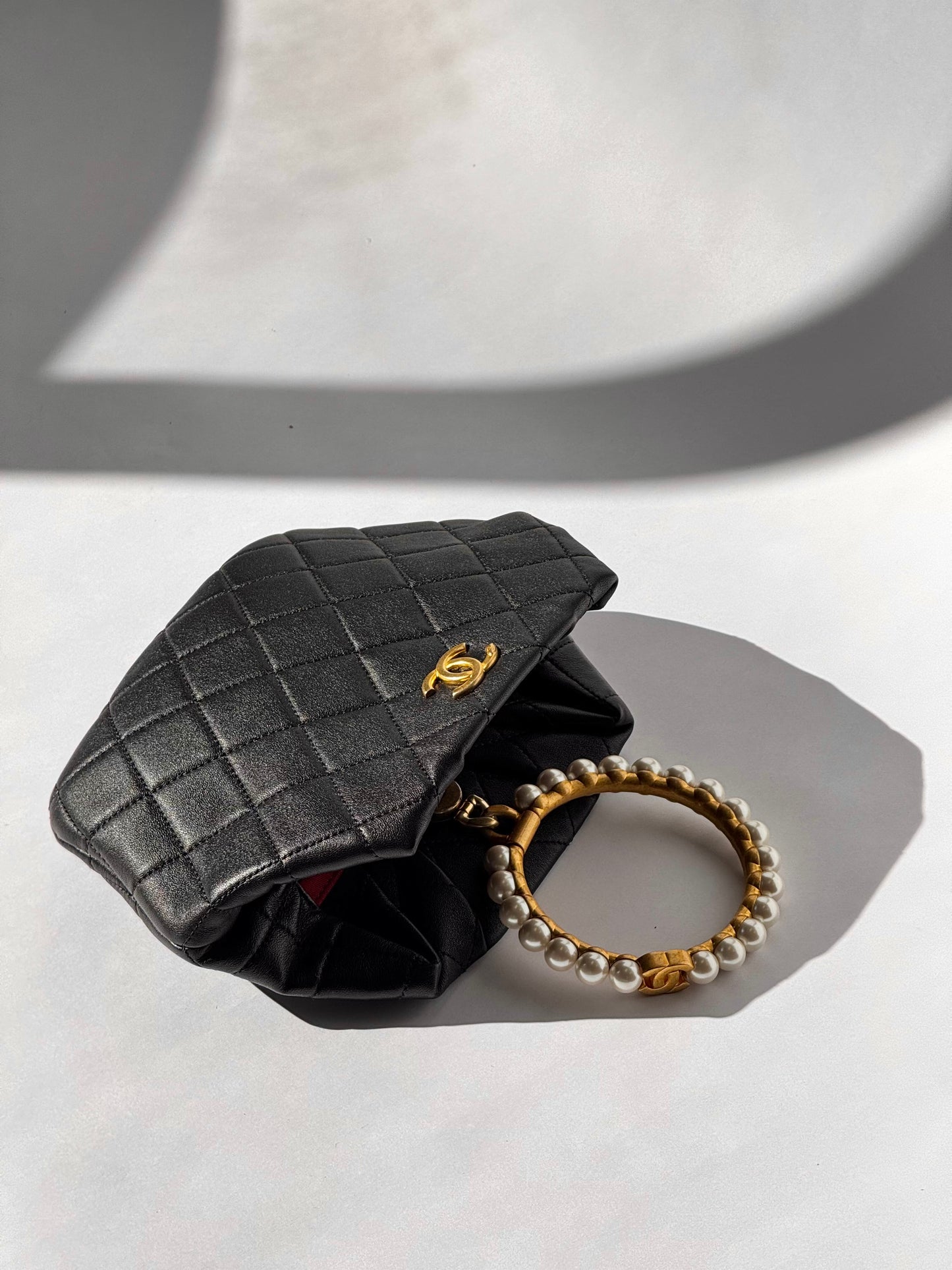 Chanel Black Lambskin Quilted Pearl Clutch