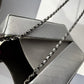 Chanel Runway Iridescent Silver Lambskin Lait De Coco Milk Carton Bag