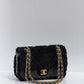 Chanel 24K Black Shearling Medium Flap Bag