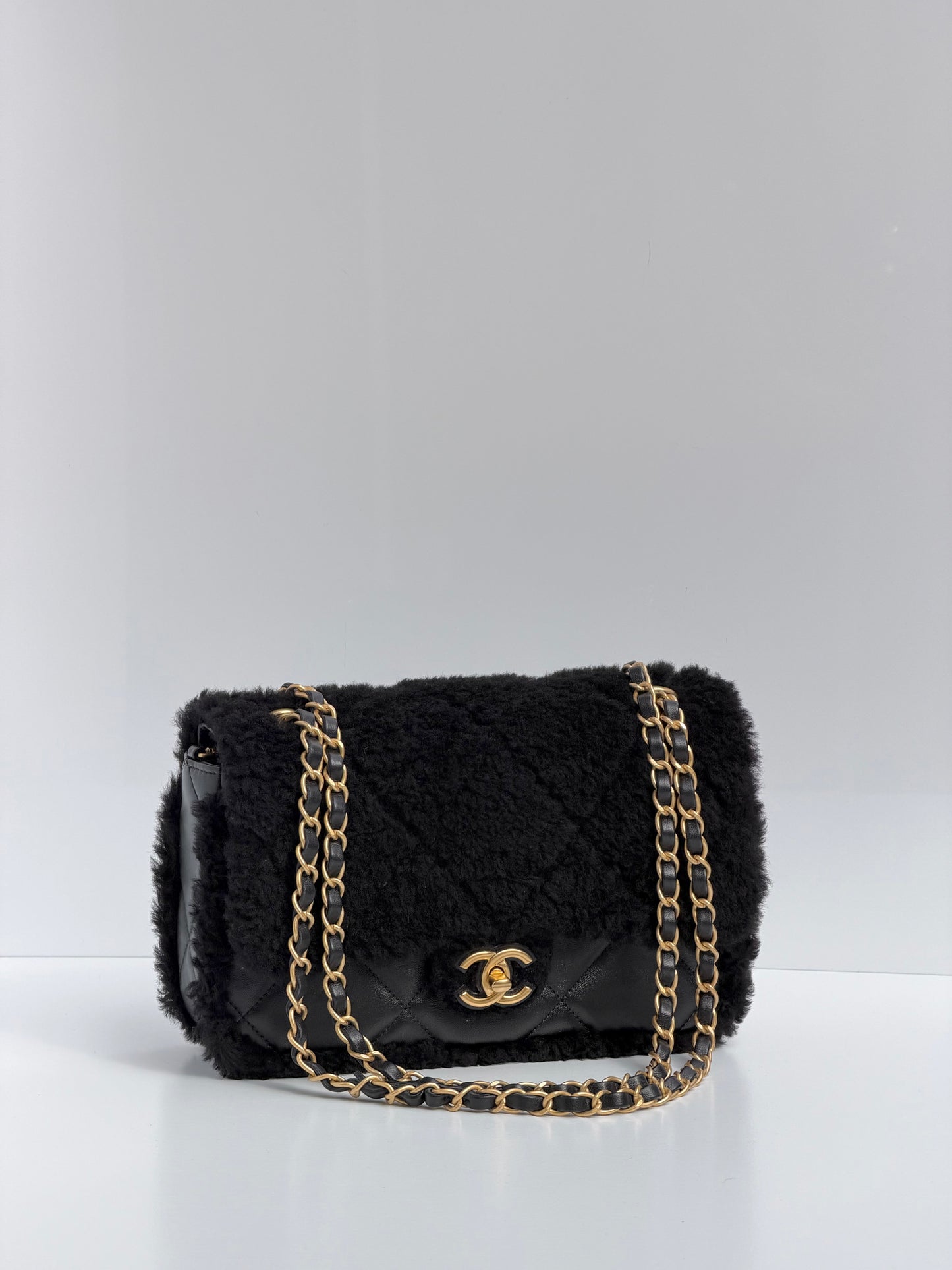 Chanel 24K Black Shearling Medium Flap Bag