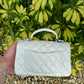 Chanel 21S Mini Iridescent White Caviar Top Handle