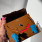 Hermes "Quelle Idolle" Gold Picto Kelly Doll