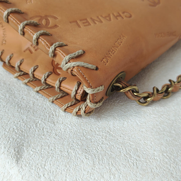Chanel Maxi Classic Flap Bag Tan Debossed Logo Calfskin Whipstitched Gold Hardware 1994