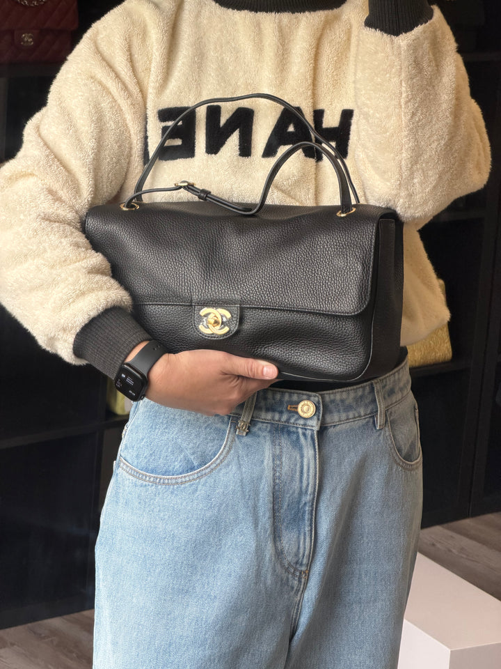 Chanel Maxi 32 Flap Bag Black Souplissimo Grained Calfskin Gold Tone Hardware 2026