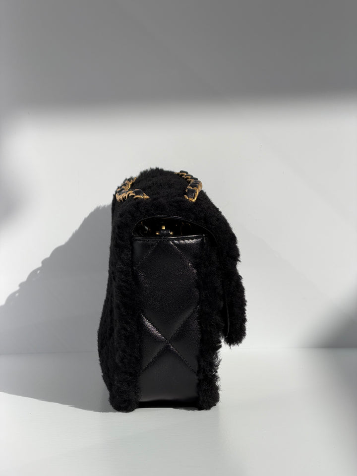 Chanel 24K Black Shearling Medium Flap Bag