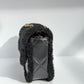 Chanel 24K Black Shearling Medium Flap Bag