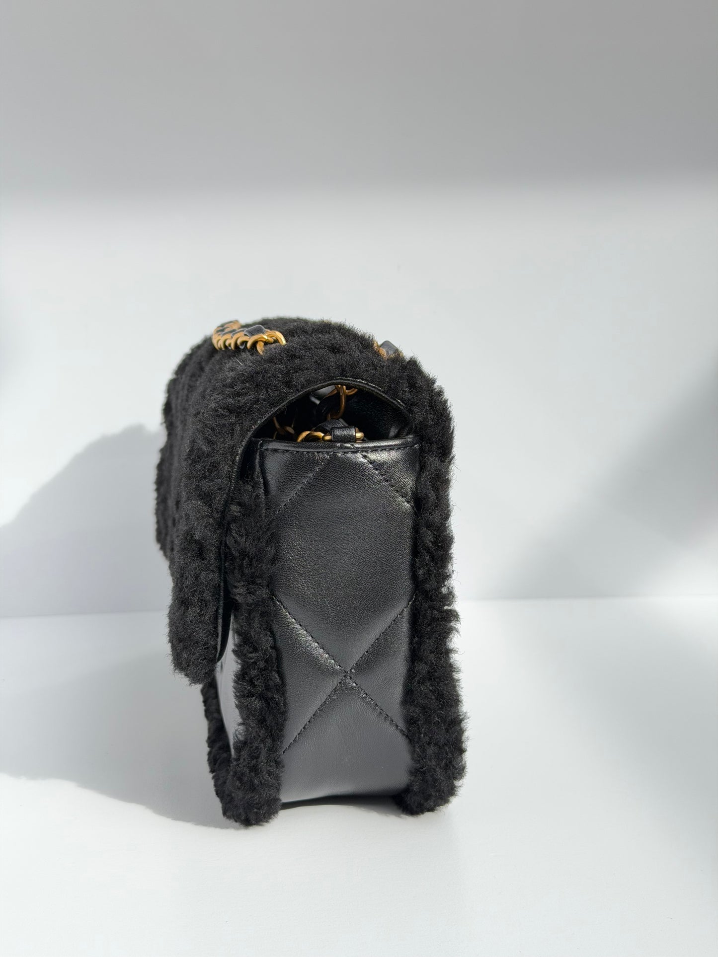 Chanel 24K Black Shearling Medium Flap Bag