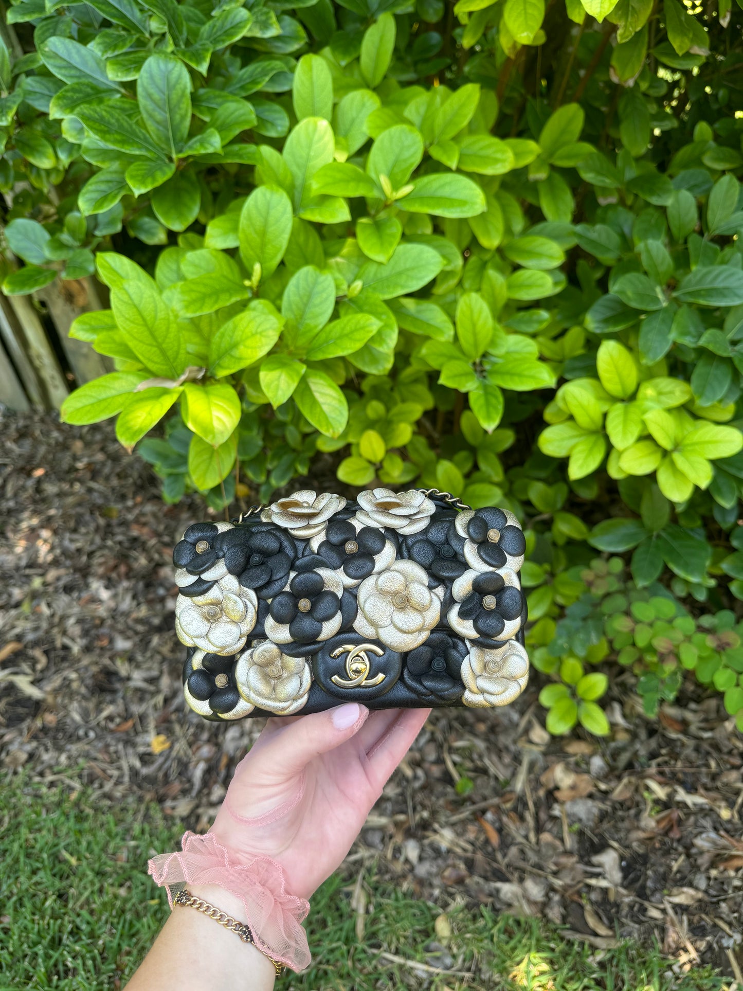 Chanel Metallic Gold And Black Lambskin Camellia Rose Appliqué Mini Rectangle Flap