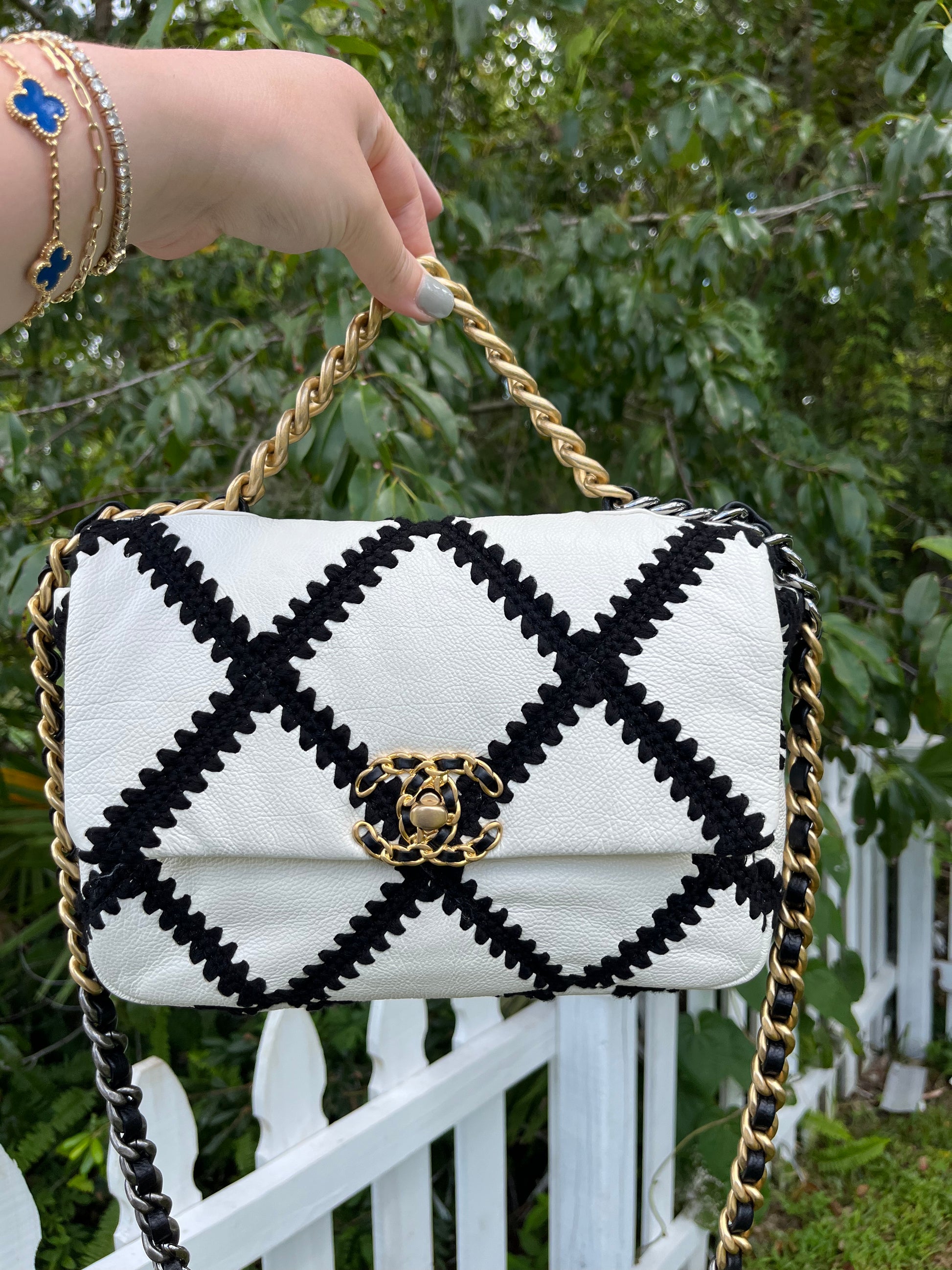 chanel quilted bag white black