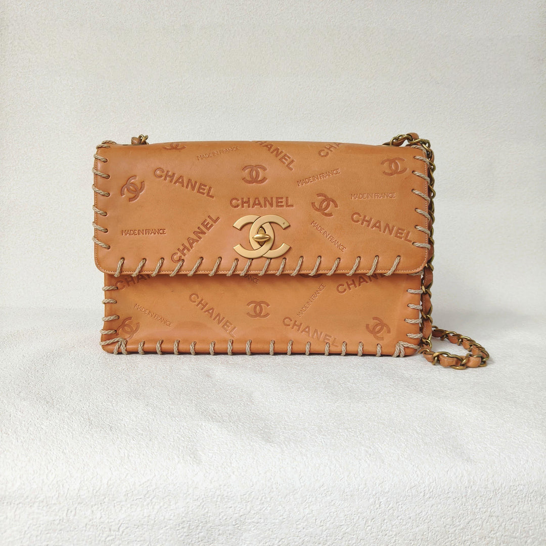 Chanel Maxi Classic Flap Bag Tan Debossed Logo Calfskin Whipstitched Gold Hardware 1994