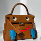 Hermes "Quelle Idolle" Gold Picto Kelly Doll