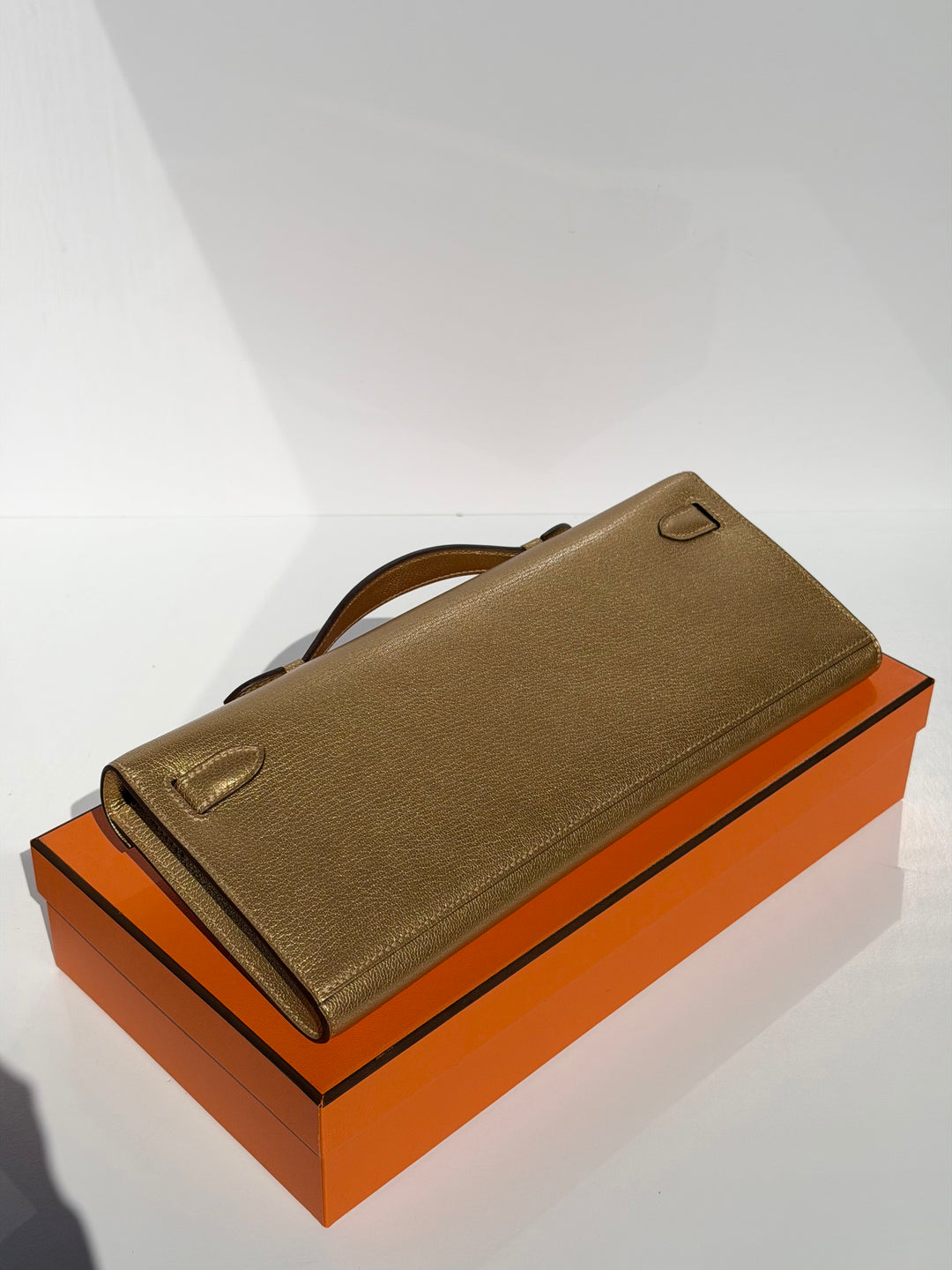 Hermes Kelly Cut Gold Metallic Chevre Dore