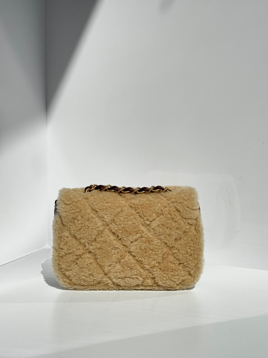 Chanel 25K Brown Mini Shearling Flap Bag