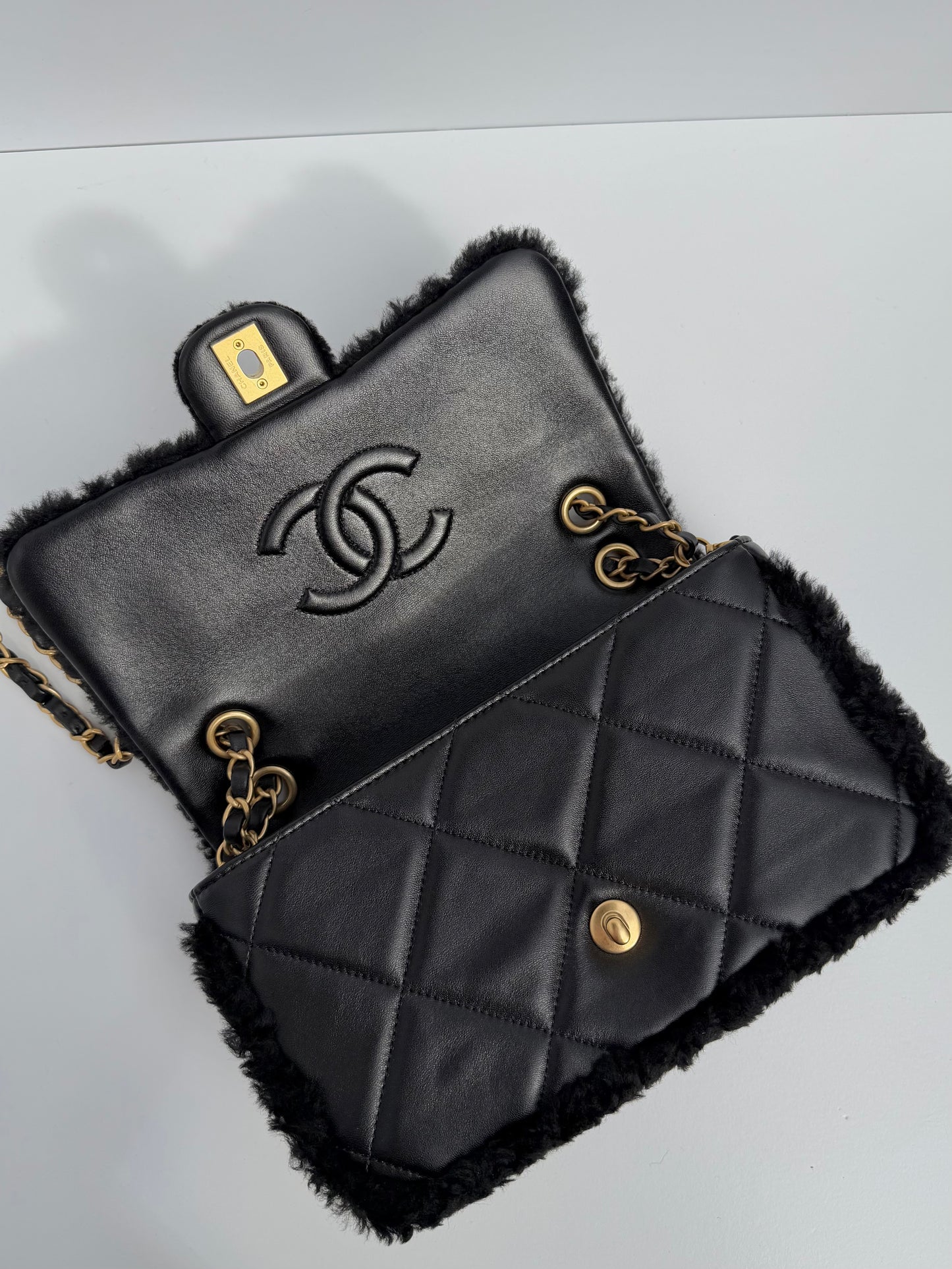 Chanel 24K Black Shearling Medium Flap Bag