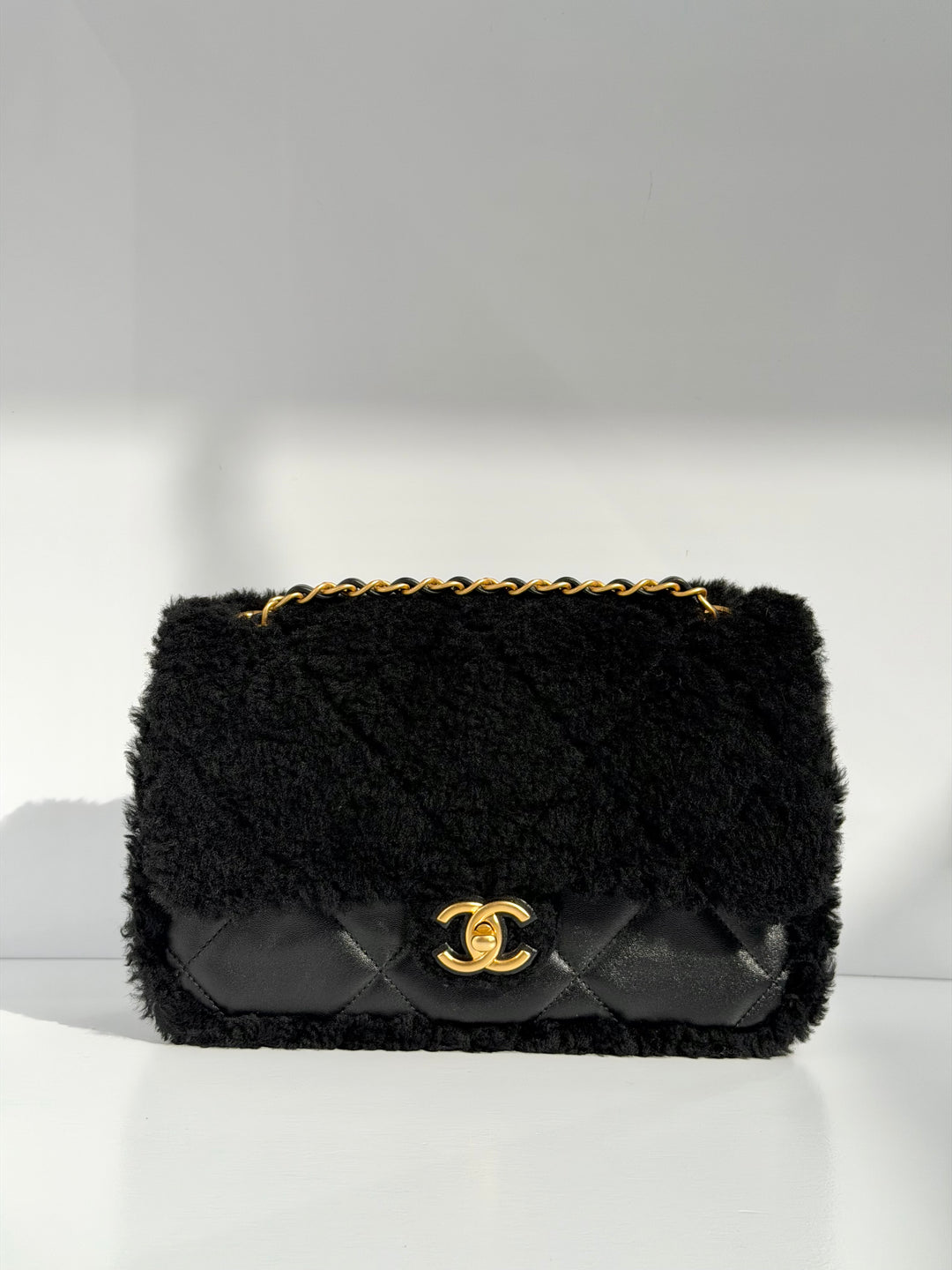 Chanel 24K Black Shearling Medium Flap Bag