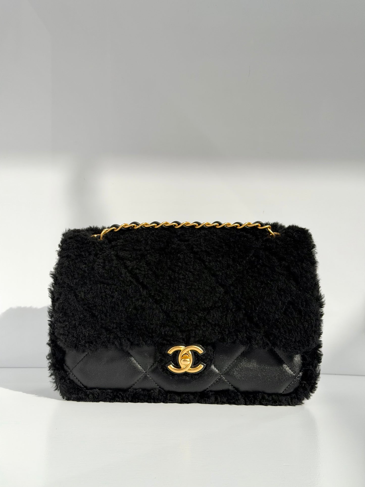 Chanel 24K Black Shearling Medium Flap Bag