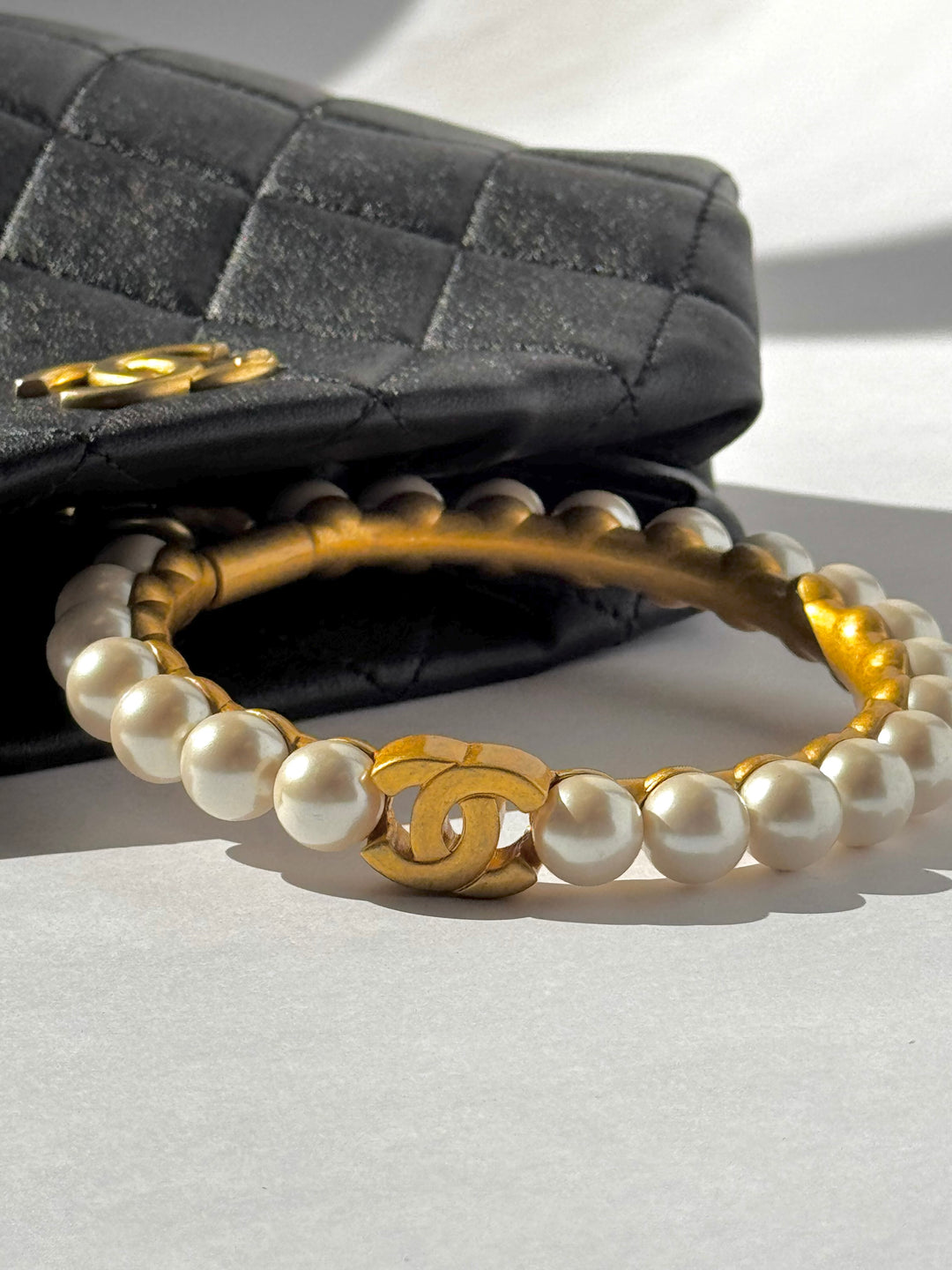 Chanel Black Lambskin Quilted Pearl Clutch