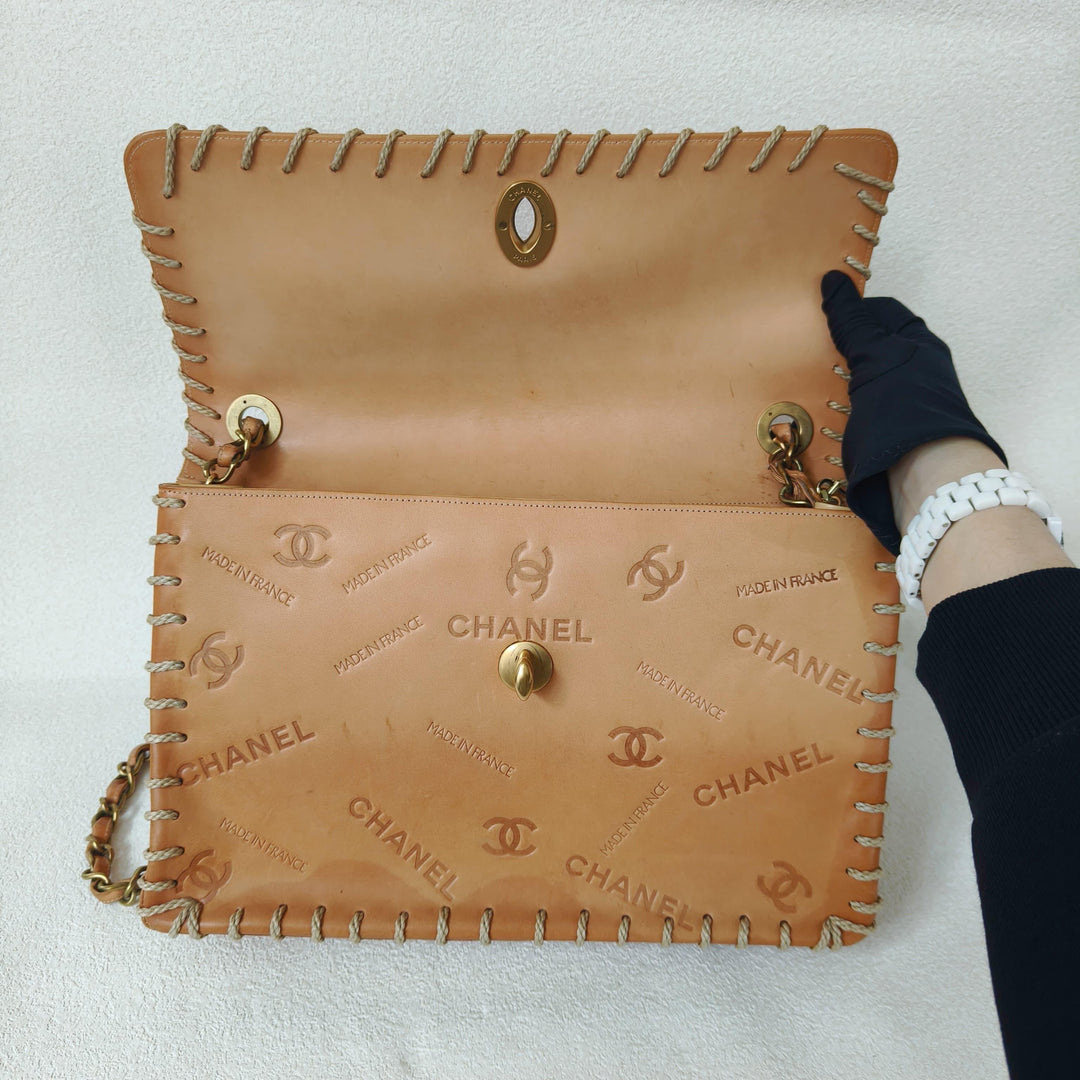 Chanel Maxi Classic Flap Bag Tan Debossed Logo Calfskin Whipstitched Gold Hardware 1994