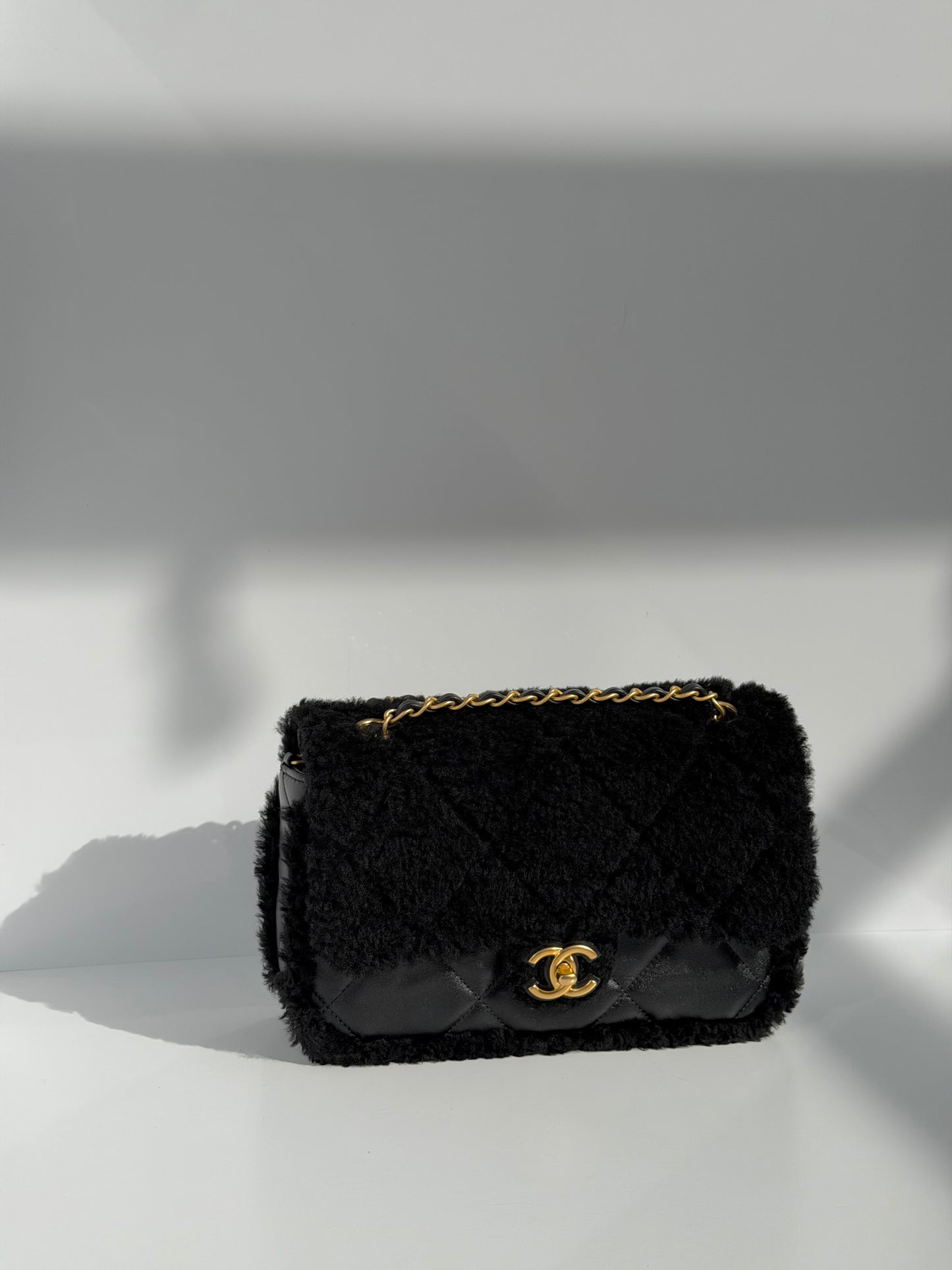 Chanel 24K Black Shearling Medium Flap Bag