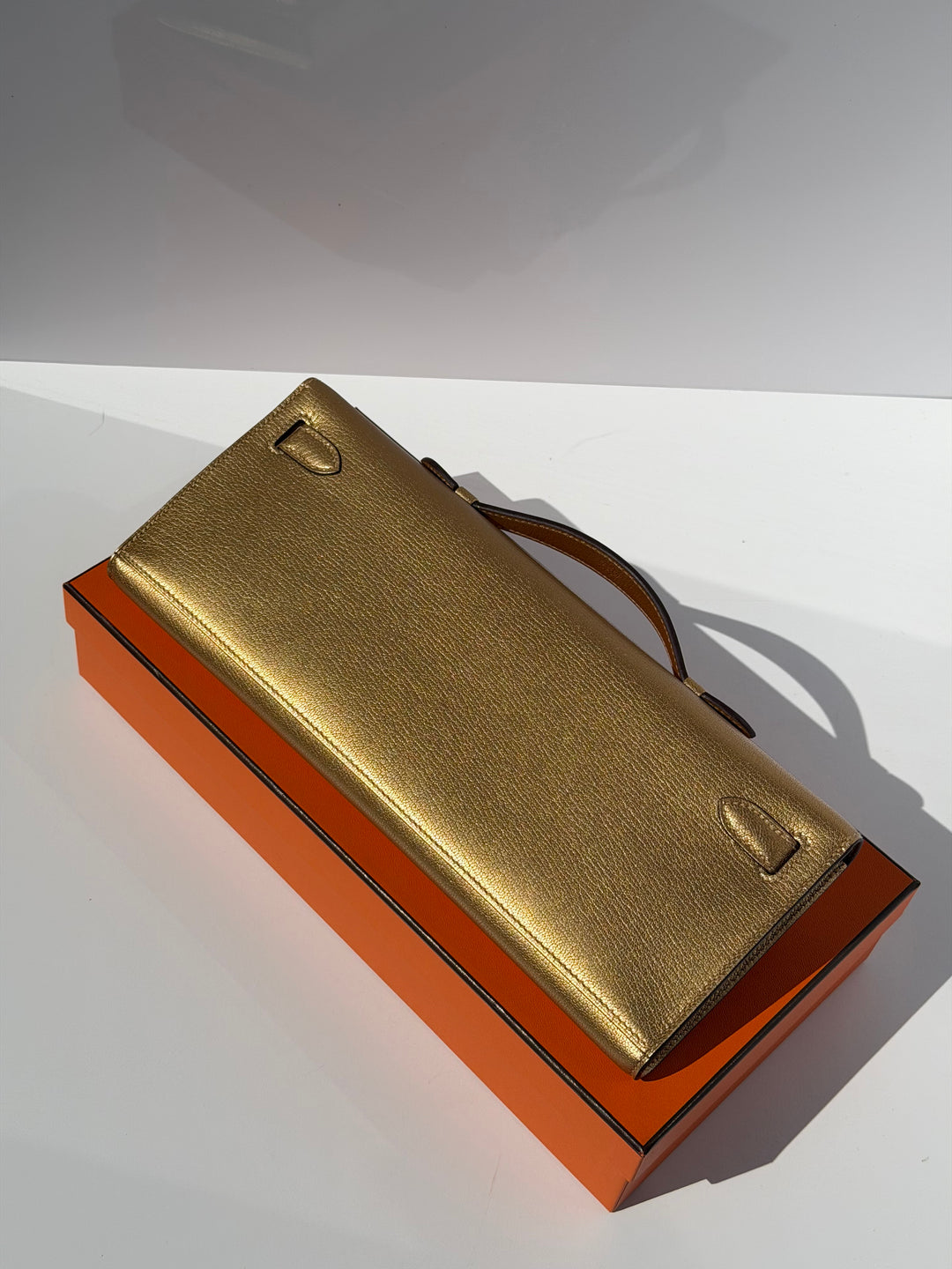 Hermes Kelly Cut Gold Metallic Chevre Dore