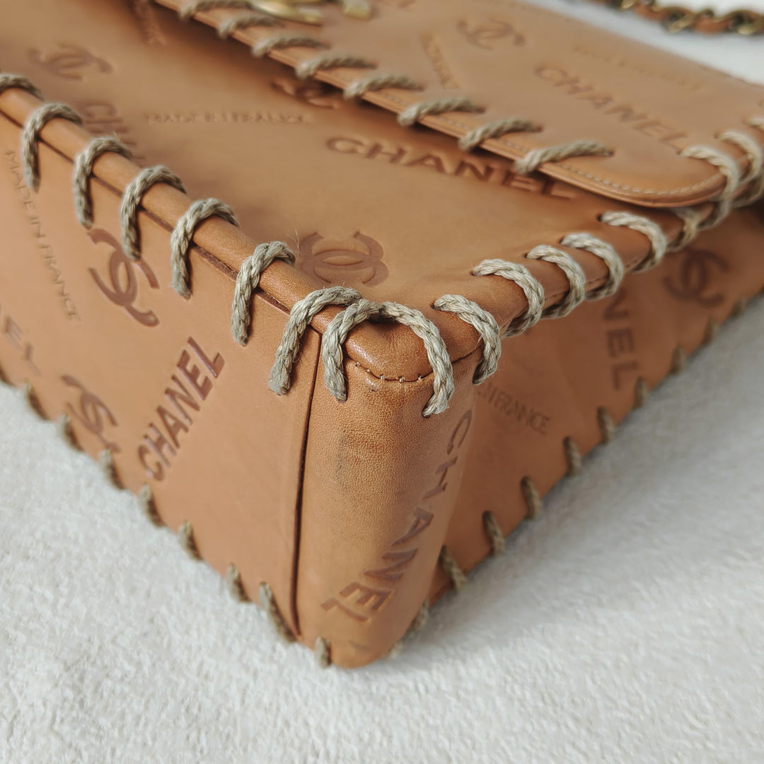 Chanel Maxi Classic Flap Bag Tan Debossed Logo Calfskin Whipstitched Gold Hardware 1994