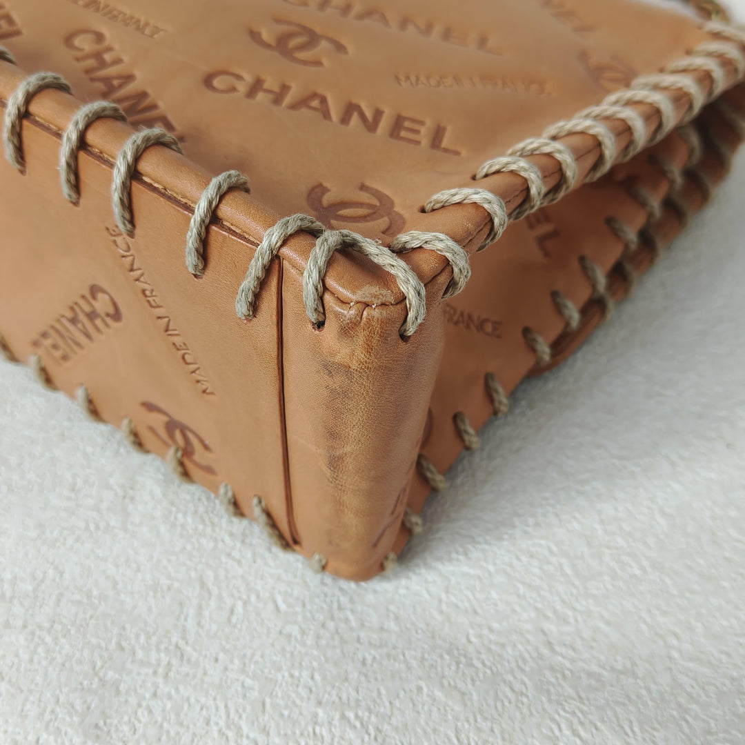 Chanel Maxi Classic Flap Bag Tan Debossed Logo Calfskin Whipstitched Gold Hardware 1994
