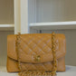 Chanel Caramel 24K Medium Caviar Diana Flap Bag