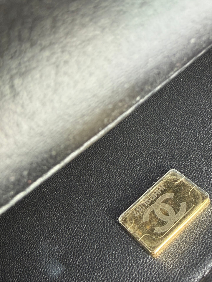 Chanel 24K Black Shearling Medium Flap Bag