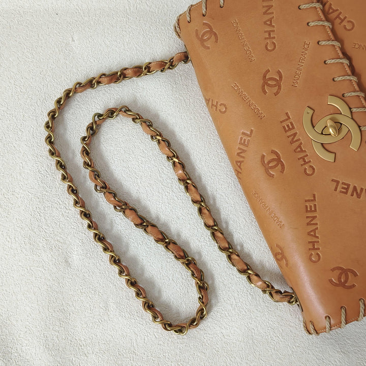 Chanel Maxi Classic Flap Bag Tan Debossed Logo Calfskin Whipstitched Gold Hardware 1994