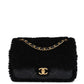 Chanel 24K Black Shearling Medium Flap Bag