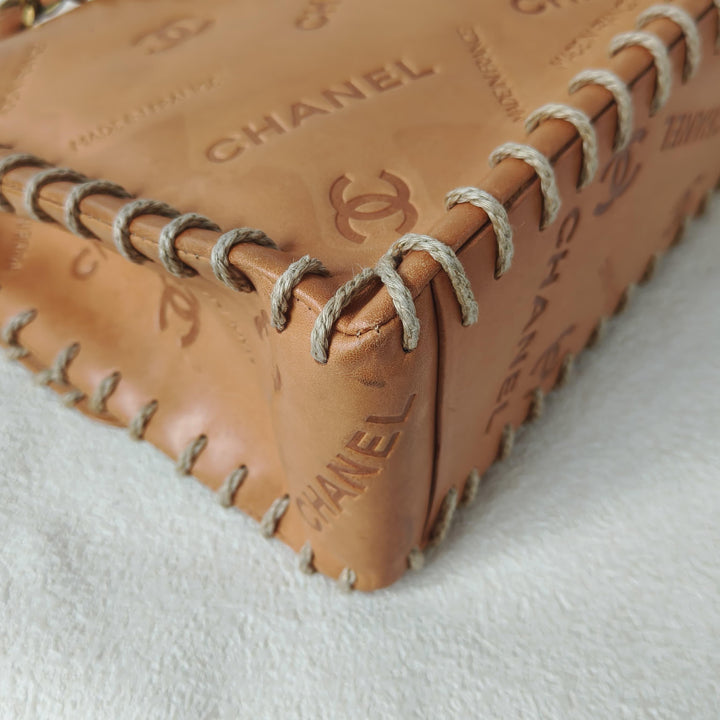 Chanel Maxi Classic Flap Bag Tan Debossed Logo Calfskin Whipstitched Gold Hardware 1994