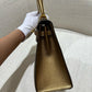 Hermes Limited Edition Bronze Chèvre Metallic Kelly 25 Sellier