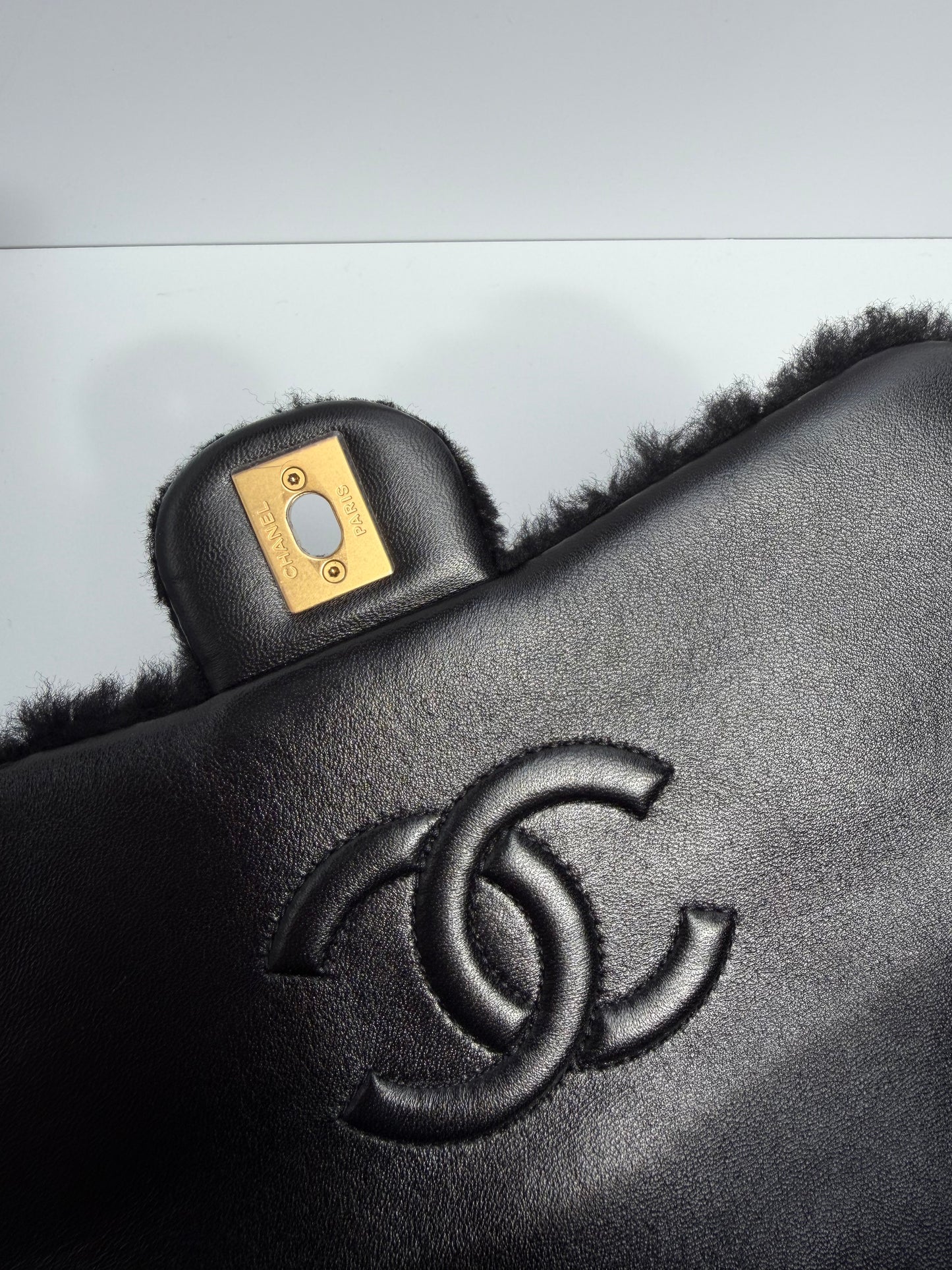 Chanel 24K Black Shearling Medium Flap Bag