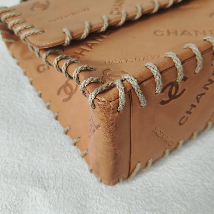 Chanel Maxi Classic Flap Bag Tan Debossed Logo Calfskin Whipstitched Gold Hardware 1994