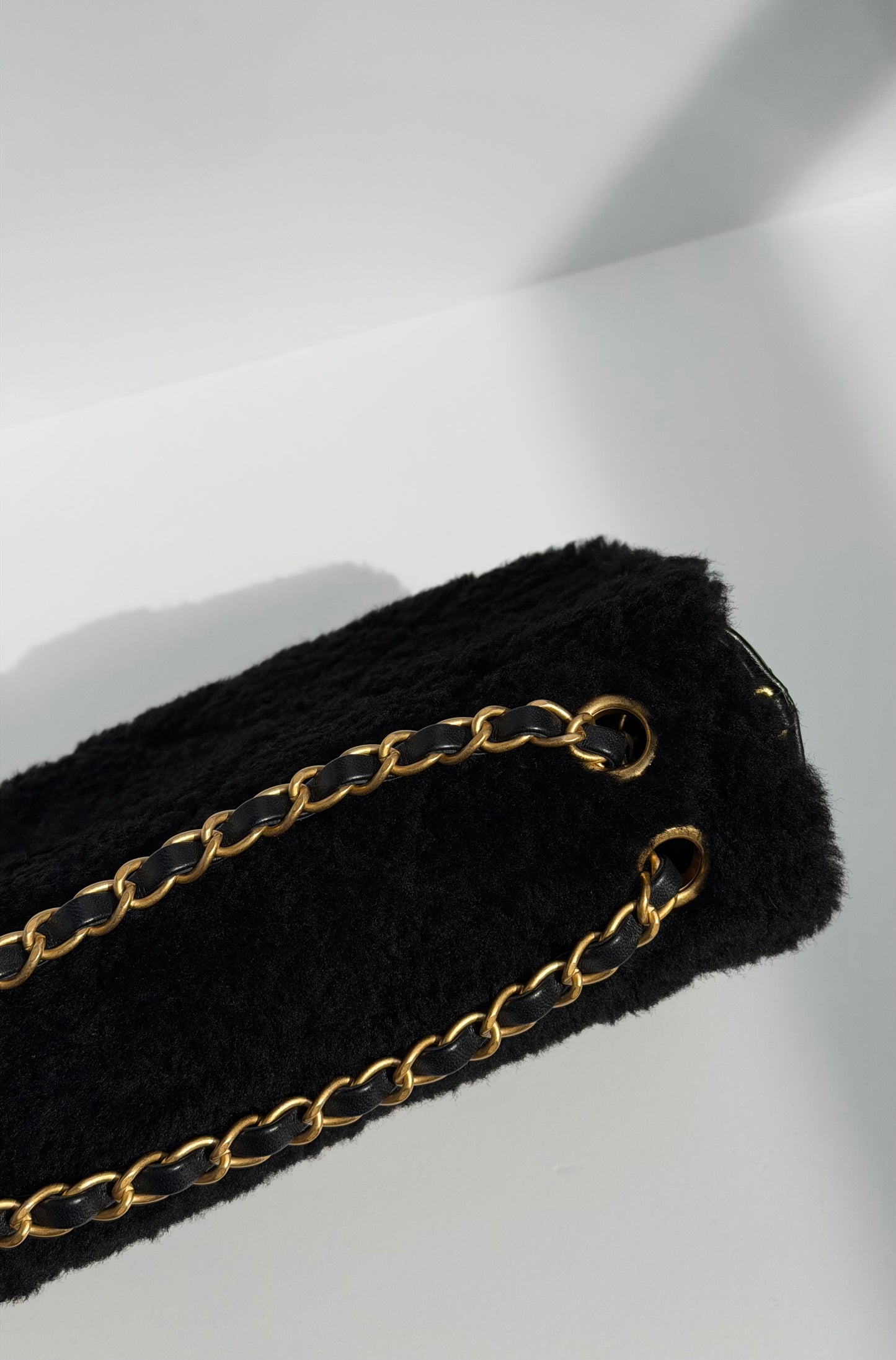 Chanel 24K Black Shearling Medium Flap Bag