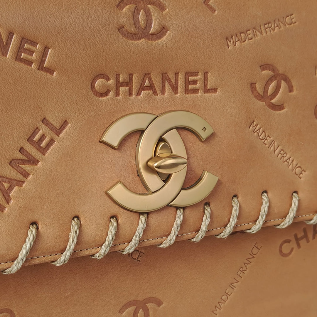 Chanel Maxi Classic Flap Bag Tan Debossed Logo Calfskin Whipstitched Gold Hardware 1994