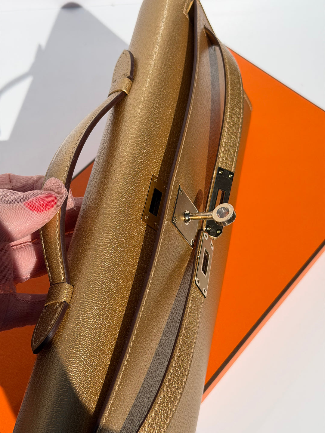 Hermes Kelly Cut Gold Metallic Chevre Dore