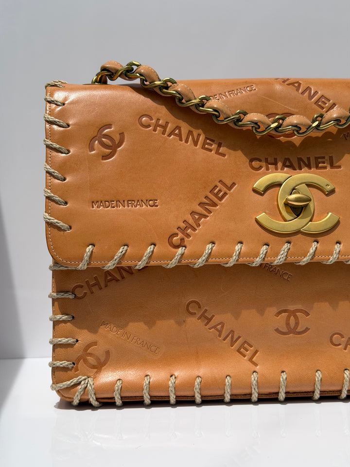 Chanel Jumbo Classic Flap Bag Tan Debossed Logo Calfskin Whipstitched Gold Hardware 1994