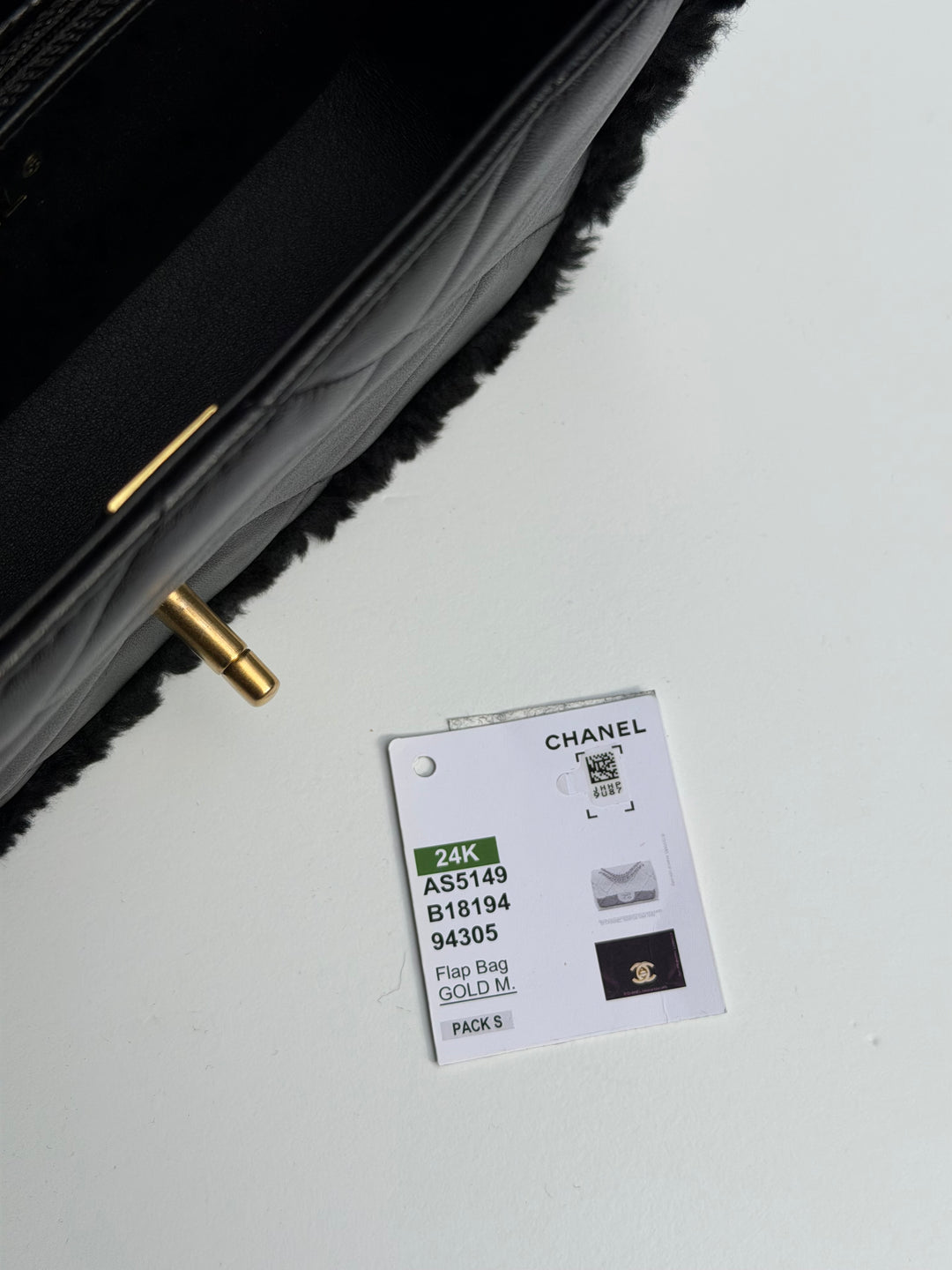 Chanel 24K Black Shearling Medium Flap Bag