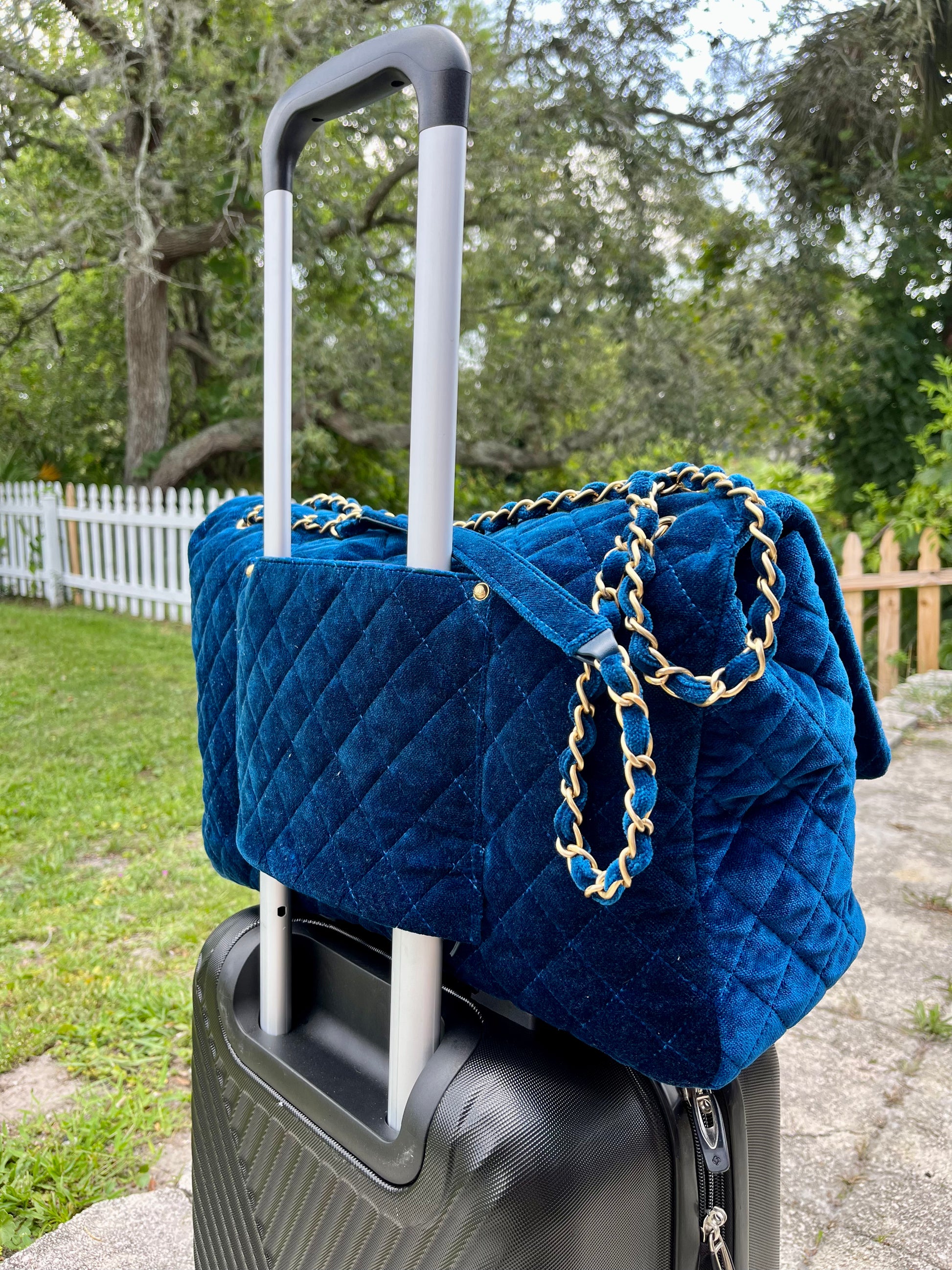 A LIMITED EDITION BLUE SUEDE XXL FLAP BAG WITH LIGHT GOLD HARDWARE