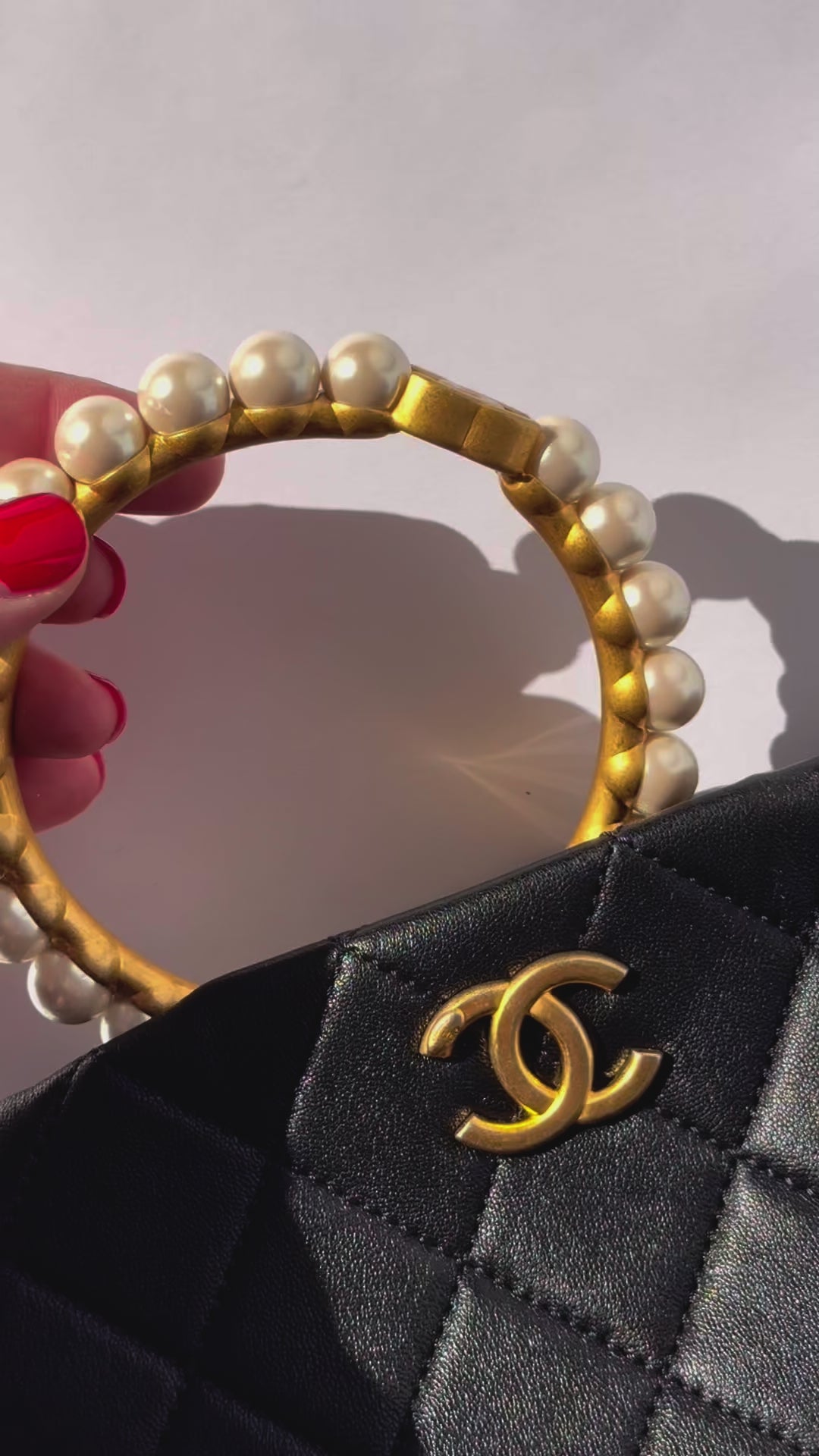 Chanel Black Lambskin Quilted Pearl Clutch